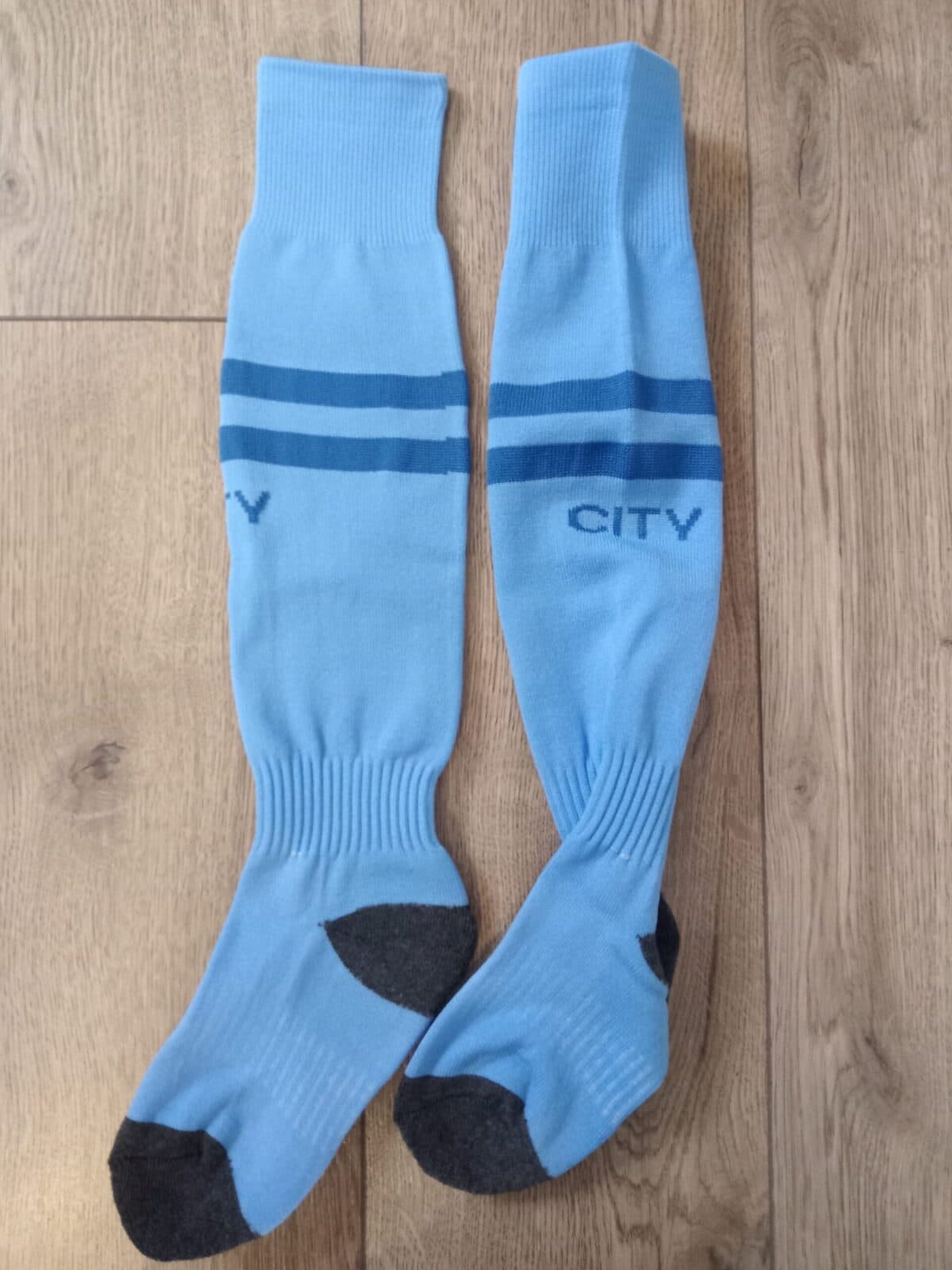 Детские футбольные гетры SPOINT MANCHESTER CITY HOME 2024, голубые, размер 32-39