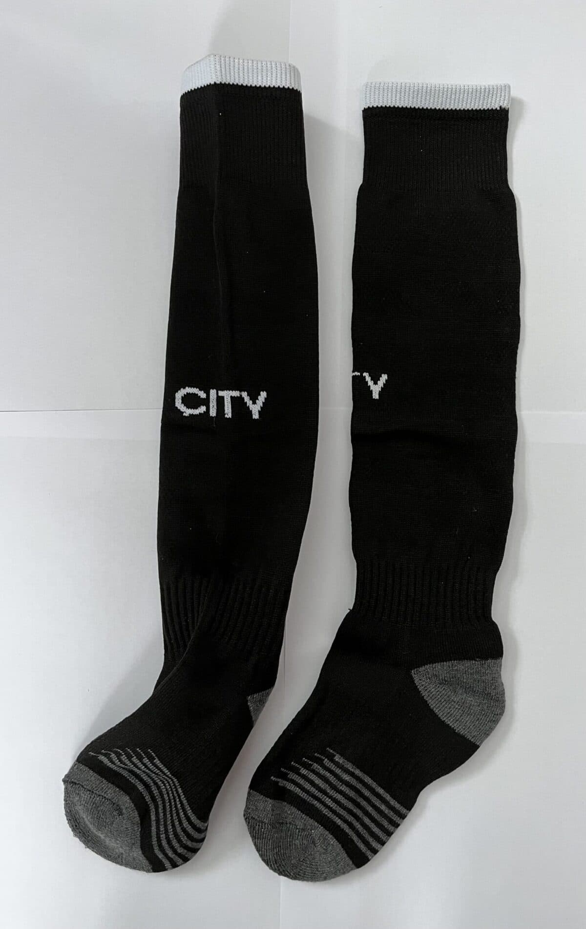 Дитячі футбольні гетри Manchester City Away 2026, чорні, розмір 27–35