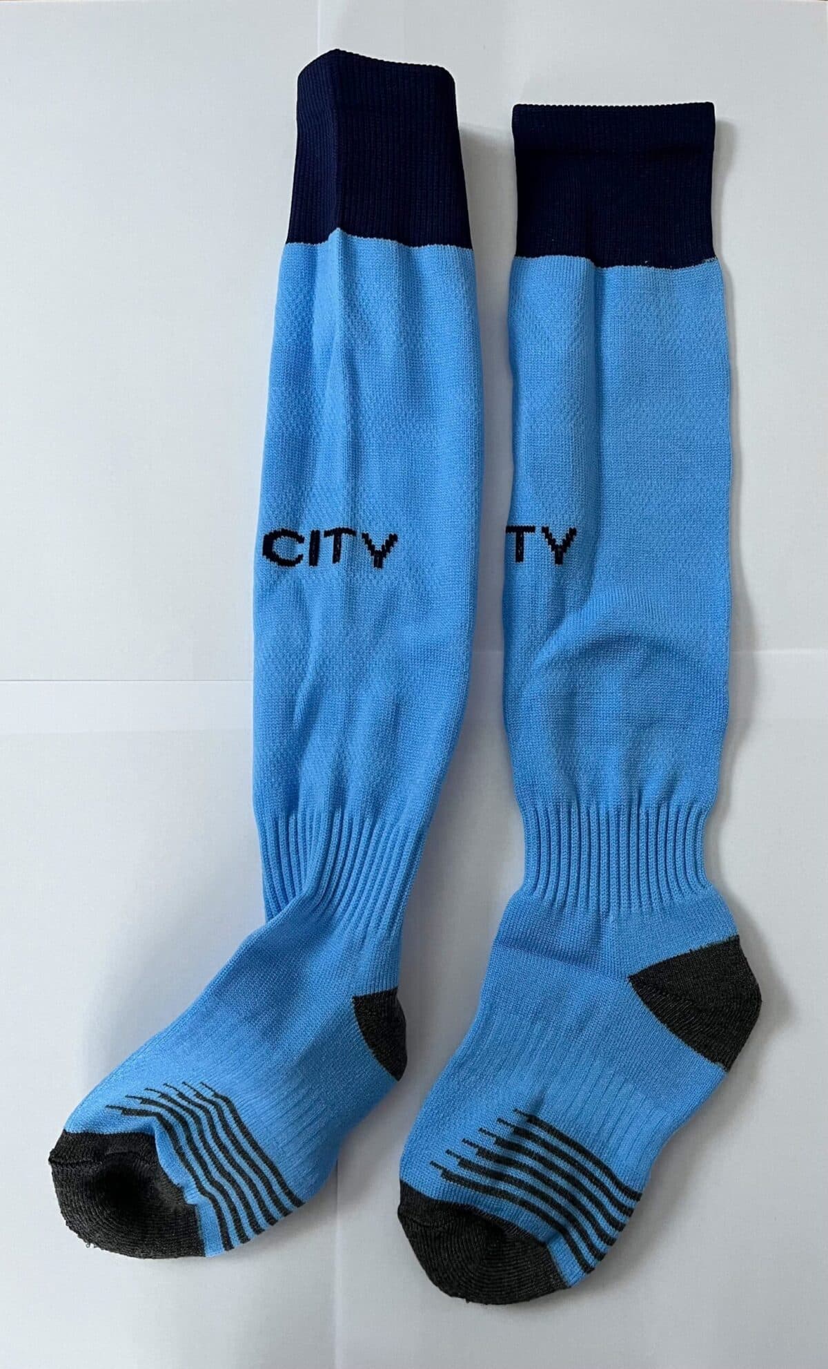 Детские футбольные гетры Manchester City Home 2026, голубо-черные, размер 27-35