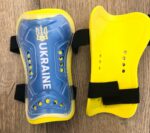 Щитки футбольні PATRIK розмір М, кольори в асортименті