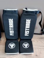 Захист гомілки та стопи з фіксатором FISTRAGE, розміри S-XL, колір - чорний