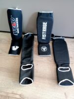 Захист гомілки та стопи з фіксатором FISTRAGE, розміри S-XL, колір - чорний